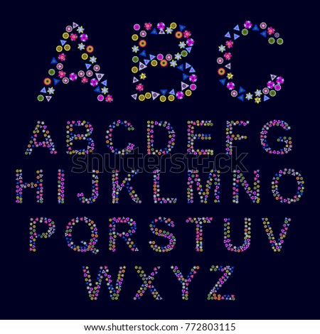 Creative alphabet out of abstract geometric shapes placed on dark background. Bright pink, blue, yellow colors.