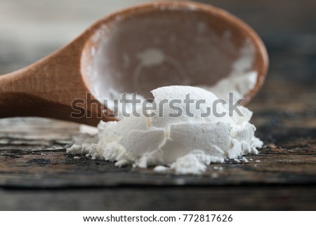 Corn Starch Spilled from a Teaspoon Royalty-Free Stock Photo #772817626