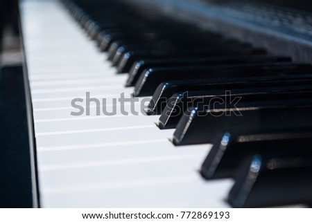 close up of piano keys close frontal view