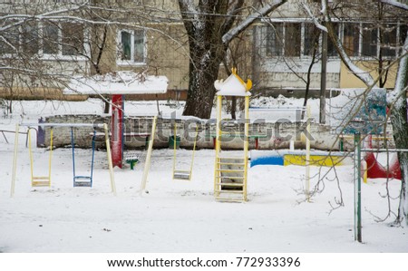 Playground covered with snow.