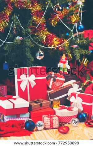 Red luxury New Year gift. Christmas gift. Happy New Year 2018. Christmas background with gift box. Christmastime celebration.