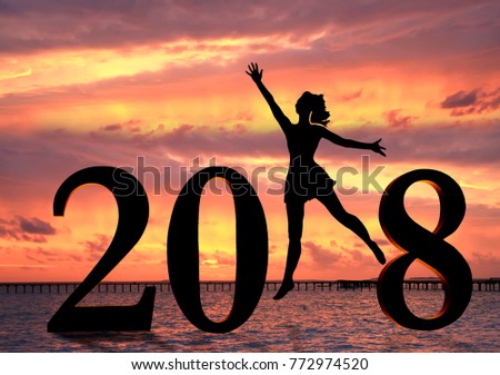 Happy new year card 2018. Silhouette of young woman on the beach as a part of the Number 2018 sign.
