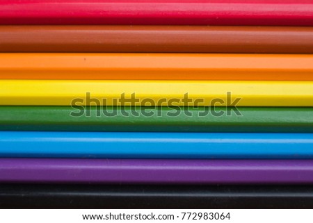 Background of multicolored pencils close-up