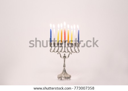 Hanukkah Menorah with 8 lighted candles Jewish holidays symbol