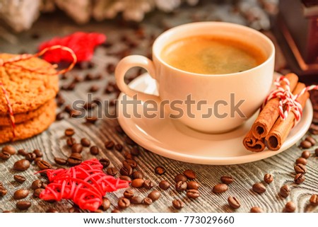 Cozy winter setting with cup of coffee