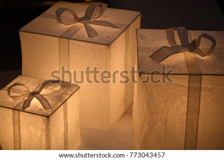 Three beautiful, bright christmas packages.