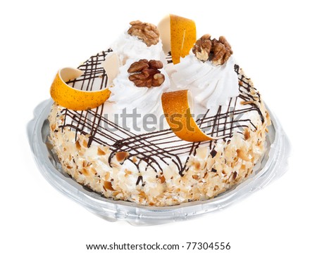 Cake with cream and nuts on white background