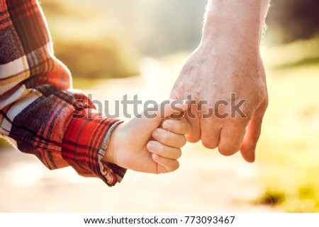 Grandfather and grandson together outdoors family concept Royalty-Free Stock Photo #773093467