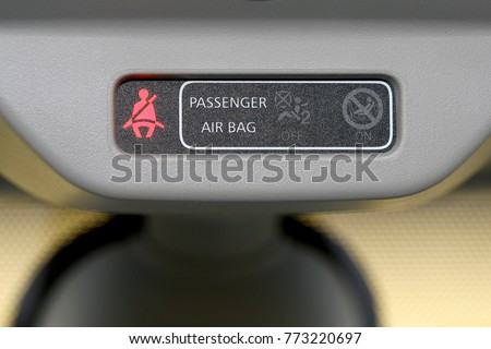 drive and passenger air bag dashboard showing the seat belt warning light
