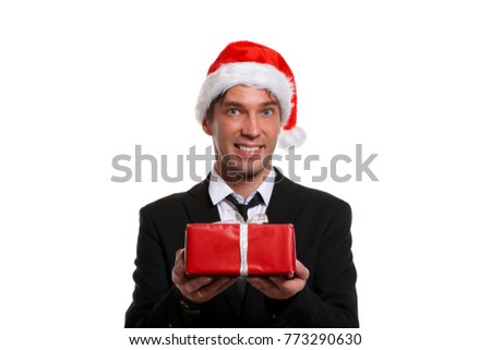 Photo of happy guy in business suit, cap of Santa with gifts in box