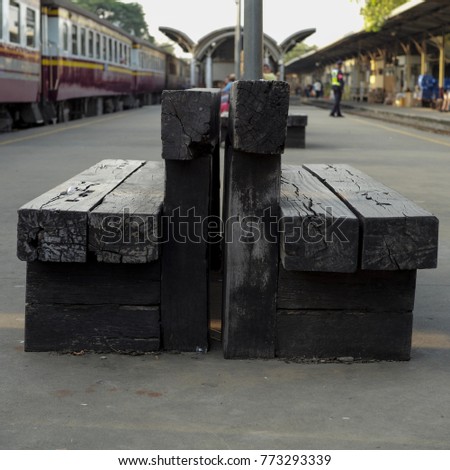 Vintage wooden bench made from old train-track