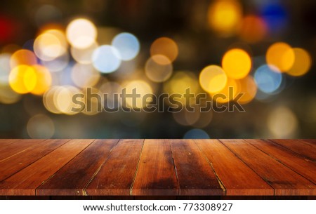 closeup top wood table with Blur Background, for your photo montage or product display, Space for placing items on the table.
