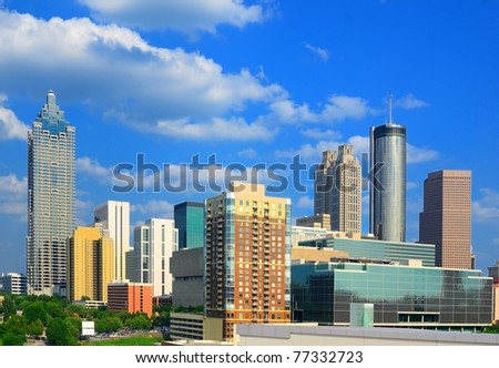 The skyline of Atlanta Georgia with downtown corporate building logos visible.