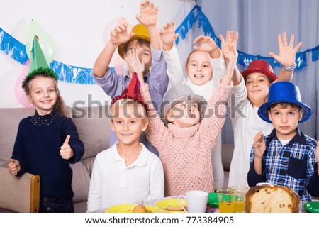 Cheerful of children happy to celebrate friend`s birthday during dinner