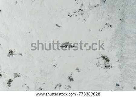 Gray cement wall texture, concrete surface closeup. Grunge rock backdrop, building decoration