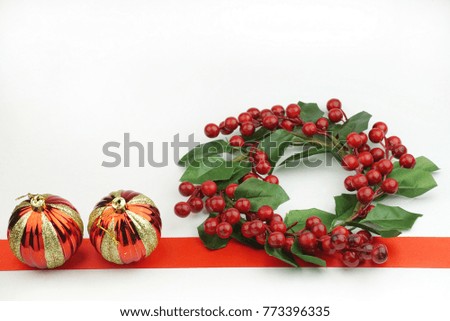 Christmas ornaments with red ribbon, isolated white background