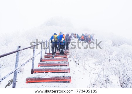 Hiking in the winter with trekking photo .winter mountains landscape snow in korea