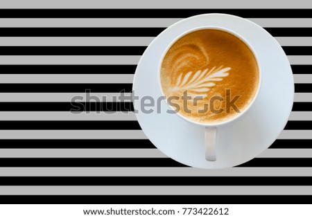 Latte coffee art on black & white background.