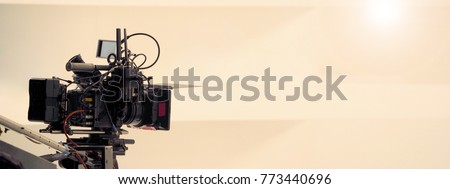 Behind the scenes of video shooting production crew team and professional camera equipment in studio.  Royalty-Free Stock Photo #773440696