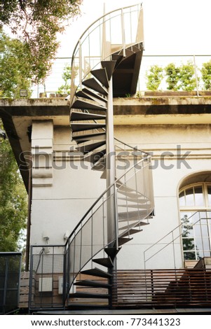 
The outside of the modern steel spiral staircase.