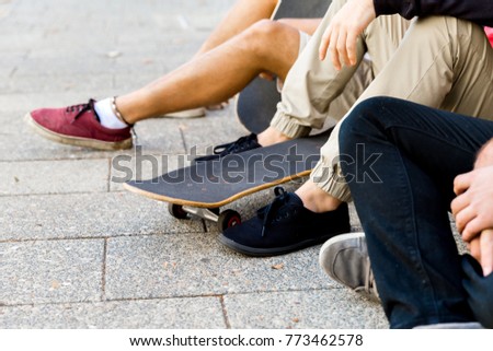Skaters having a break at the street