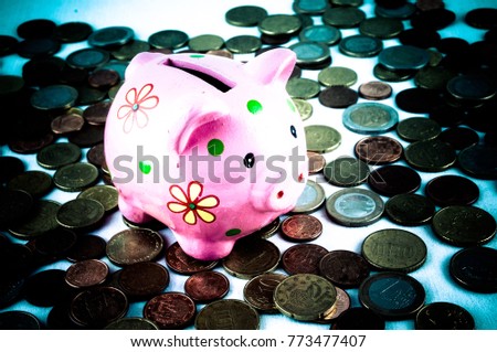 Picture of a Business Money Concept Idea Coins and Piggy Bank