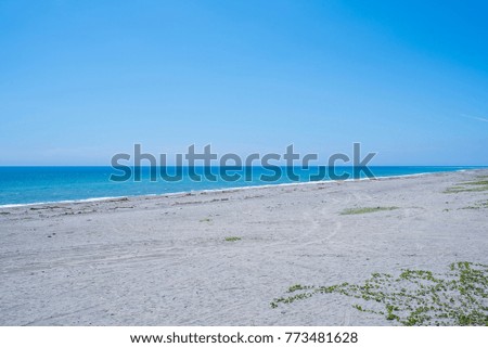 landscape of beach and sea with blue sky