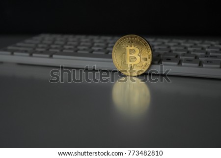Crypto currency. Gold coin Bitcoin on a dark background. Business Concept