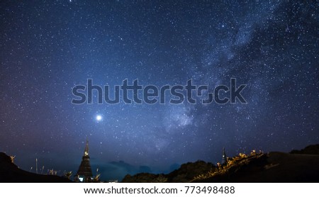 Thai Temple, the Milky Way and the stars in the beautiful night sky.