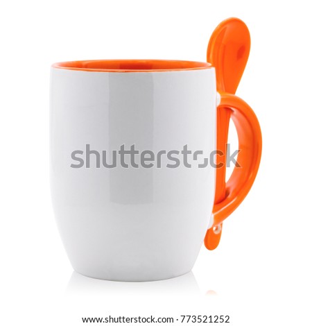 Blank coffee mug and spoon isolated on white background. Empty tea cup for your design. ( Clipping paths )