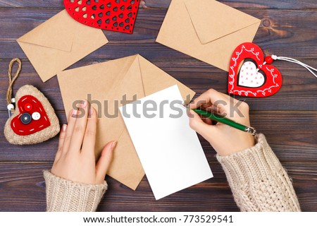 Valentines day cards and decorations, top view. Love and holiday concept. Valentine day concept with copyspace. Royalty-Free Stock Photo #773529541
