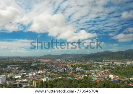 City view Phuket City in thailand on blue sky with clouds and Mountain background