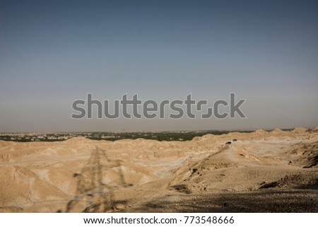 Al-Qarah mountain is a mesa that stands about 75 metres Al-Qarah village Al Hofuf, Saudi arabia.It has many caves with very cool air inside. 
