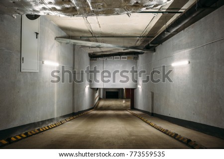 Underground car parking or garage interior, toned
