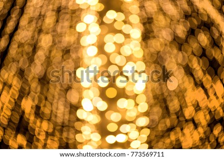 Abstract, colorful, blurry christmas background. Glowing and sparkling lights during night. 