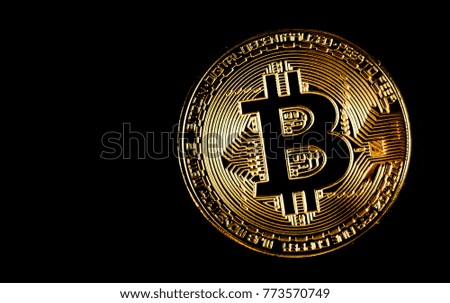 Golden bitcoin on black background. Bitcoin cryptocurrency.