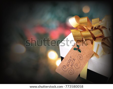 Secret Santa background with festive wrapped gift.
