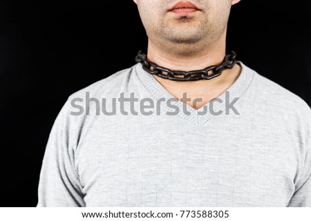 man neck chain on the dark background. Victim