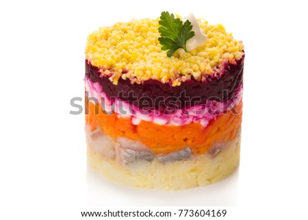 Herring in a jacket (layers of vegetables and cured herring topped with beetroot and mayo)