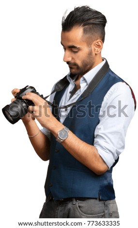 Attractive adult man with a camera isolated on white background