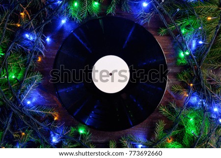 vinyl gramophone record in christmas style for christmas playlist background flat view and copy space