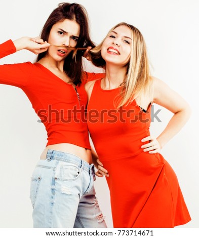 best friends teenage girls together having fun, posing emotional on white background, besties happy smiling, lifestyle people concept close up