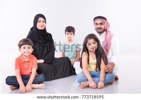 Arab family sitting at home with white background