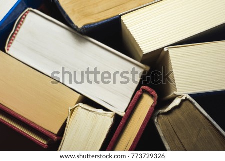 Stack of old books in a library or a room