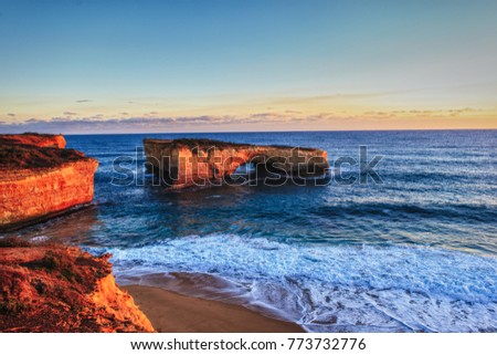 An aerial view of the 12 Apostles, a collection of limestone stacks off the shore of the Port Campbell National Park, by the Great Ocean Road in Victoria, Australia Royalty-Free Stock Photo #773732776