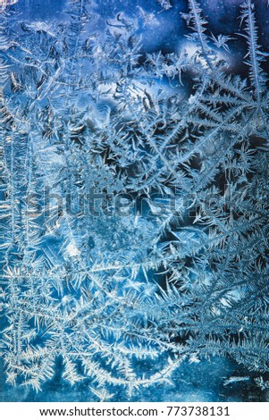 Abstract, frost on a window with blue tint Royalty-Free Stock Photo #773738131