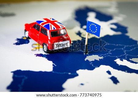 Red vintage car with Union Jack flag and brexit or bye words over an UE map and flag. Symbolizing the Brexit concept.The UK is thus on course to leave the EU on 29 March 2019 Royalty-Free Stock Photo #773740975