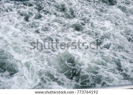 blurry images on the sea. the scenery is in the middle of the ocean. sea waves