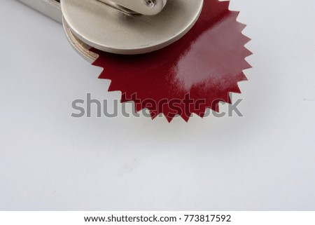 Common seal  and red sticker office stamp isolated on white.