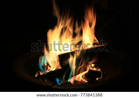 Colored powder Campfire with blue and green flame from color changer powder